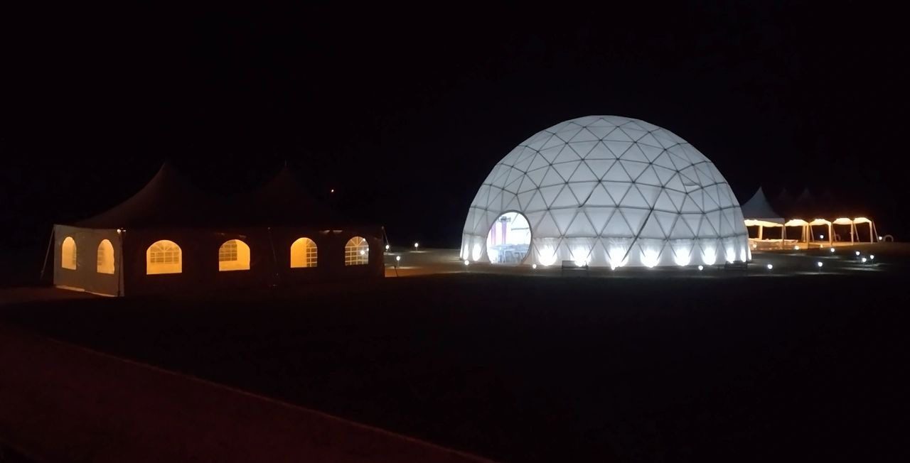 A large dome with lights on top of it.