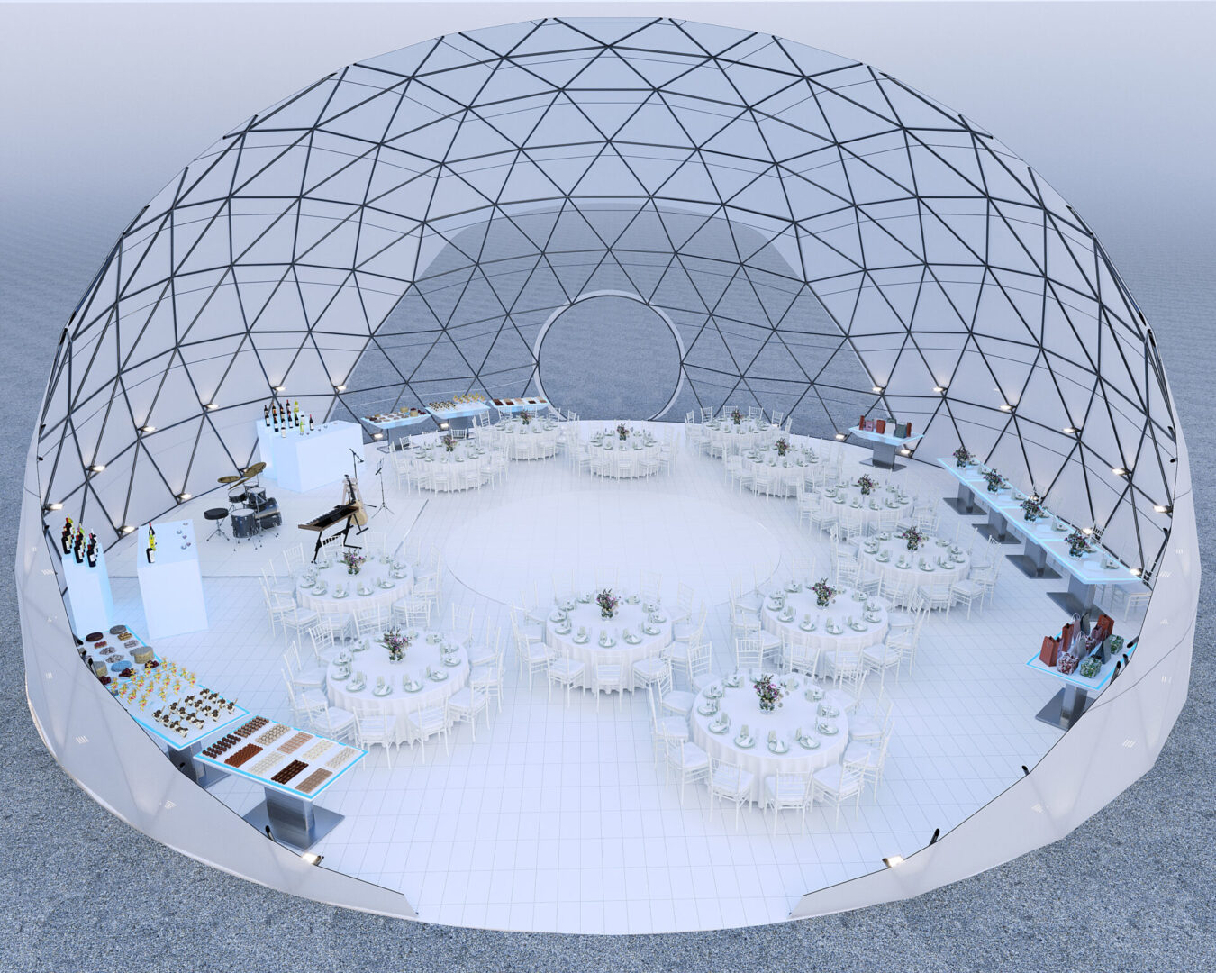A large white dome with tables and chairs in it.
